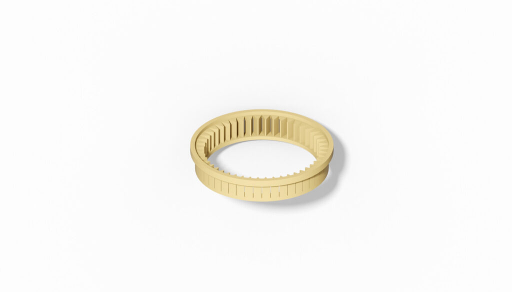 Gelber Filterring mit Rillenstruktur, geeignet für verschiedene Anwendungen in der Filtertechnik.