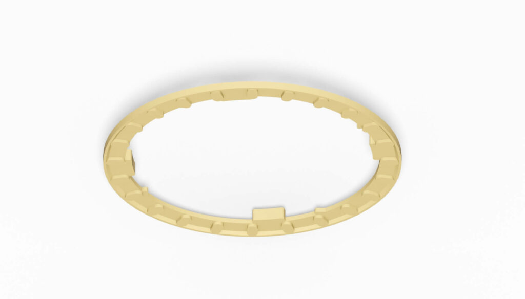 Gelber Filterring mit gleichmäßigen Einkerbungen, der eine runde Form hat und aus einem stabilen Material besteht.