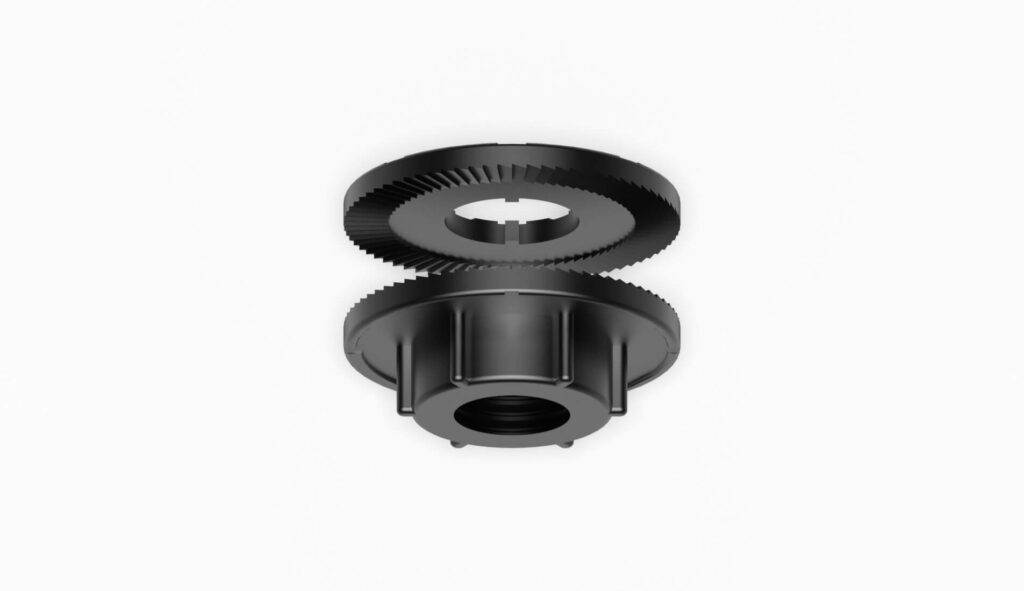 Schwarzes Filterelement mit zwei Zahnrädern und einem zentralen Gewinde zur Befestigung.